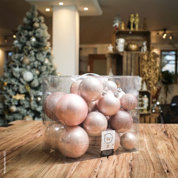 Coffret de 26 boules de Noël de couleur rose poudre mates, pailletées ou encore brillantes.